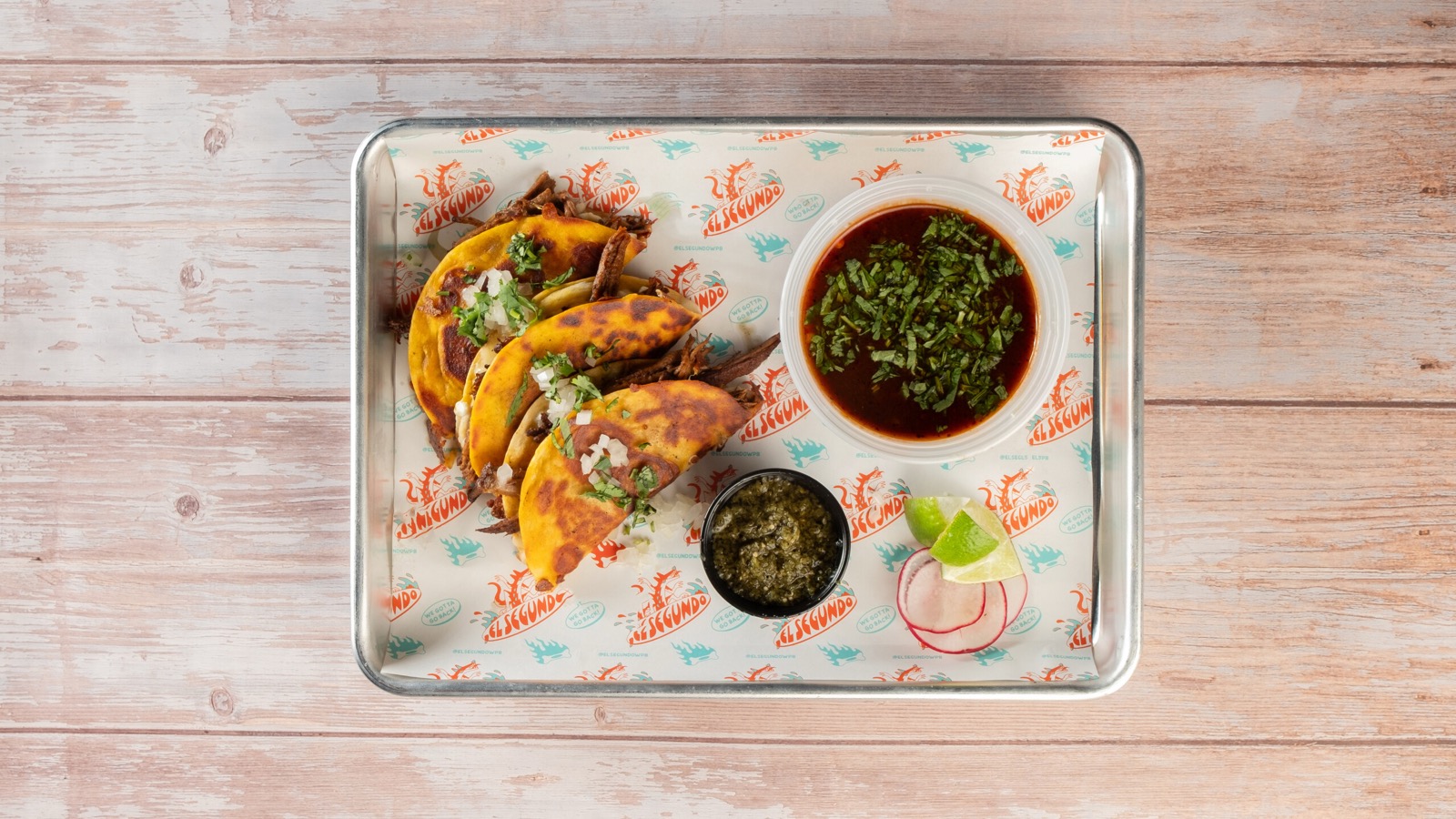 Birria tacos with consommé at El Segundo
